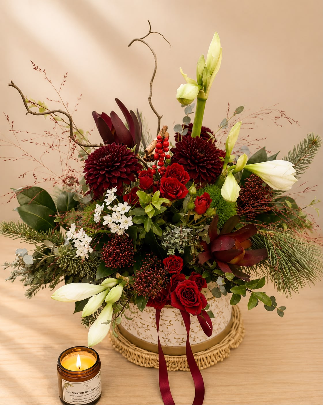 Flowers arranged in a hat box by Willow and Moss